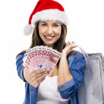 Santa woman with money and shopping bags