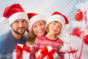 Family with Christmas gifts