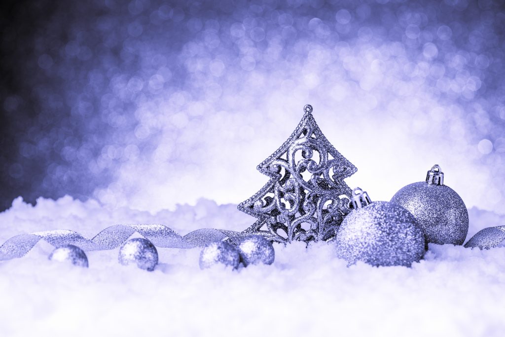 christmas fir tree decoration on glitter background