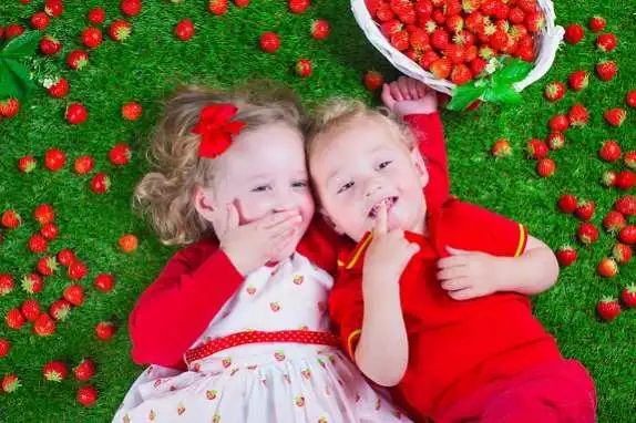 Children Eating Strawberry